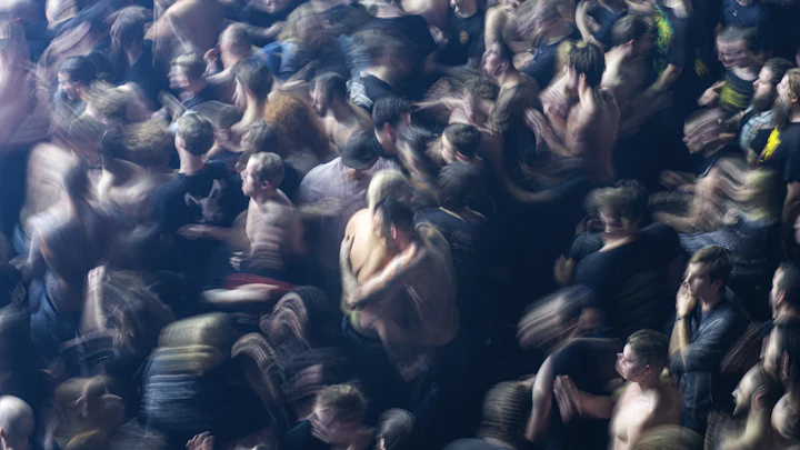 A large crowd packed together at a concert